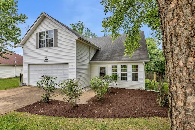 4008 Amber Way, Spring Hill, TN 37174 - traditional home featuring concrete driveway, a shingled roof, and a garage