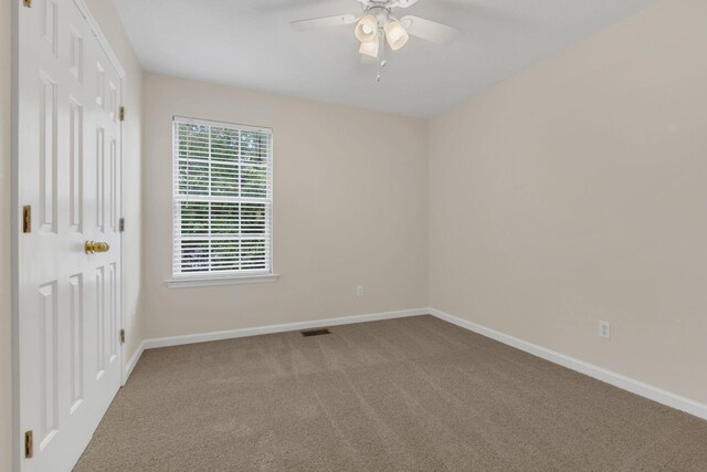 4008 Amber Way, Spring Hill, TN 37174 - unfurnished bedroom with carpet, baseboards, a ceiling fan, and a closet