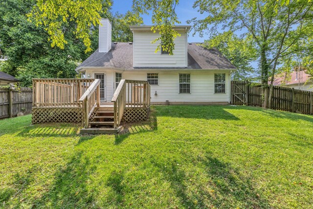 4008 Amber Way, Spring Hill, TN 37174 - rear view of house with a wooden deck and a chimney