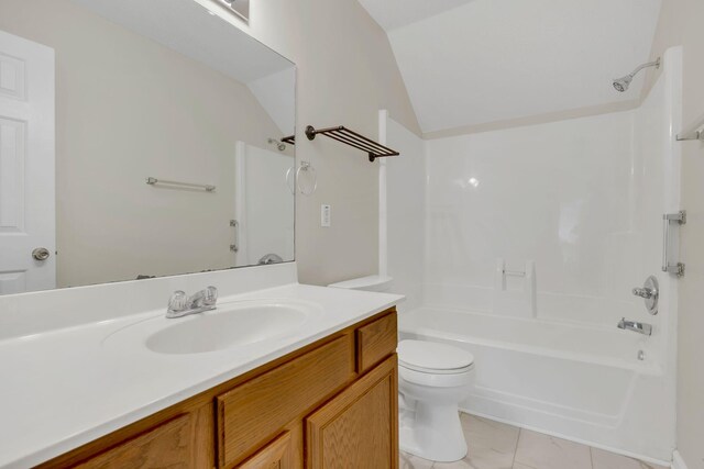 4008 Amber Way, Spring Hill, TN 37174 - bathroom featuring vanity, toilet, lofted ceiling, bathing tub / shower combination, and tile patterned flooring