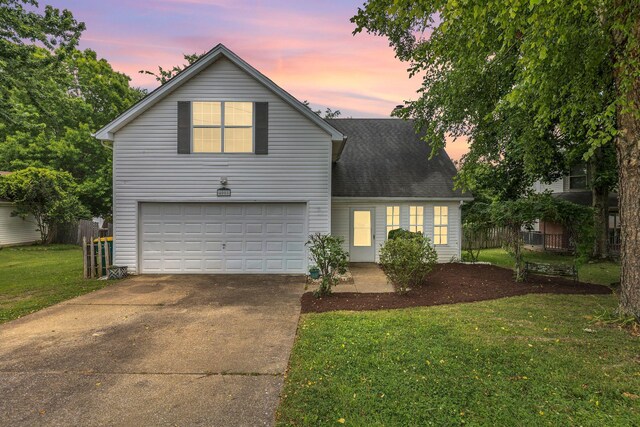 4008 Amber Way, Spring Hill, TN 37174 - traditional-style home featuring driveway, an attached garage, and a shingled roof