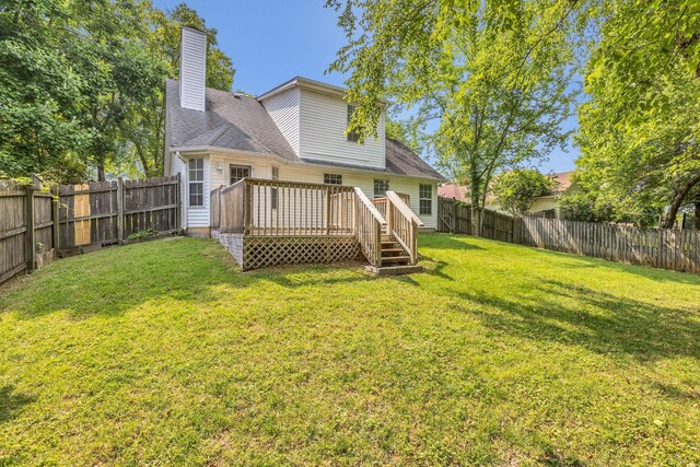 4008 Amber Way, Spring Hill, TN 37174 - rear view of house with a deck and a chimney