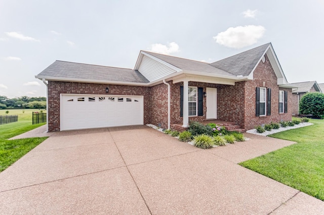 177 Hedgeway Ct, Gallatin, TN 37066 - ranch-style home with driveway, brick siding, a garage, and a shingled roof