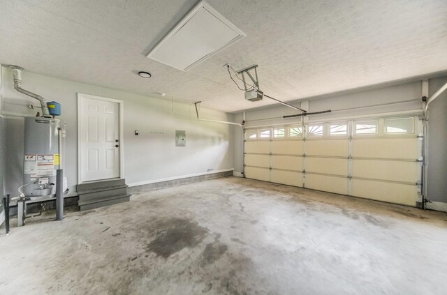177 Hedgeway Ct, Gallatin, TN 37066 - garage with water heater, a garage door opener, and electric panel