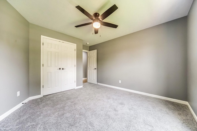 177 Hedgeway Ct, Gallatin, TN 37066 - unfurnished bedroom featuring carpet flooring, baseboards, a closet, and a ceiling fan