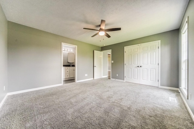 177 Hedgeway Ct, Gallatin, TN 37066 - unfurnished bedroom with baseboards, carpet, and a textured ceiling