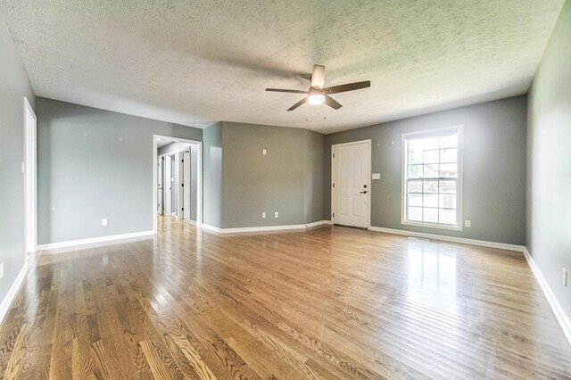 177 Hedgeway Ct, Gallatin, TN 37066 - empty room featuring ceiling fan, wood finished floors, a textured ceiling, and baseboards