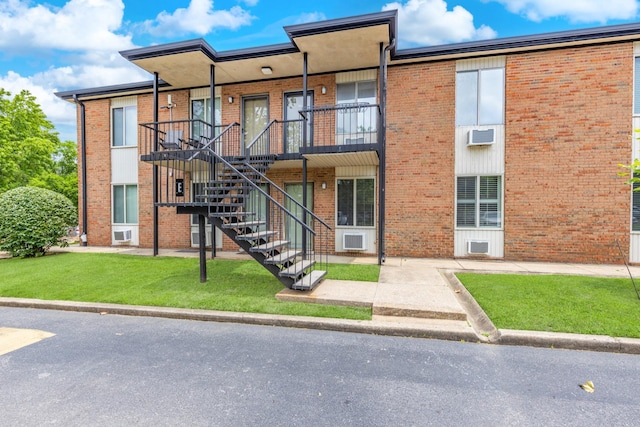 2601 Hillsboro Pike Unit E6, Nashville, TN 37212 - view of property featuring a wall mounted air conditioner and stairway