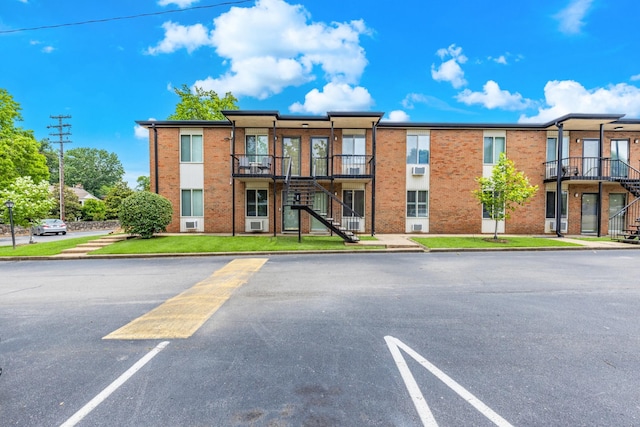 2601 Hillsboro Pike Unit E6, Nashville, TN 37212 - view of property featuring stairway and uncovered parking