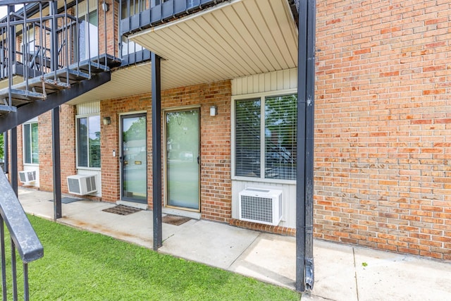 2601 Hillsboro Pike Unit E6, Nashville, TN 37212 - view of exterior entry featuring brick siding and cooling unit