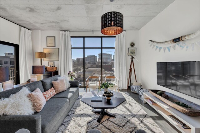 1510 Demonbreun St Unit 810, Nashville, TN 37203 - living room featuring wood finished floors