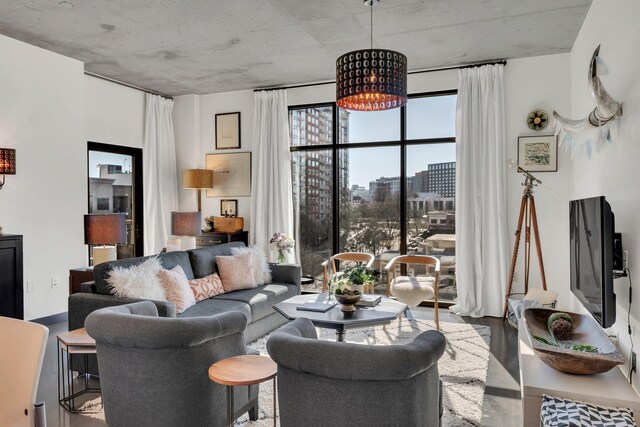 1510 Demonbreun St Unit 810, Nashville, TN 37203 - living room featuring a chandelier