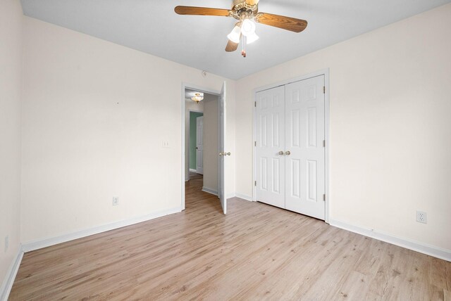 332 Meadowbrook Dr, Cadiz, KY 42211 - unfurnished bedroom featuring baseboards, light wood-style floors, a closet, and a ceiling fan
