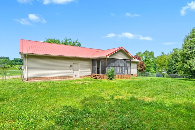 332 Meadowbrook Dr, Cadiz, KY 42211 - rear view of house with a sunroom and metal roof