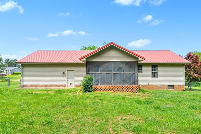 332 Meadowbrook Dr, Cadiz, KY 42211 - rear view of house featuring metal roof and a sunroom