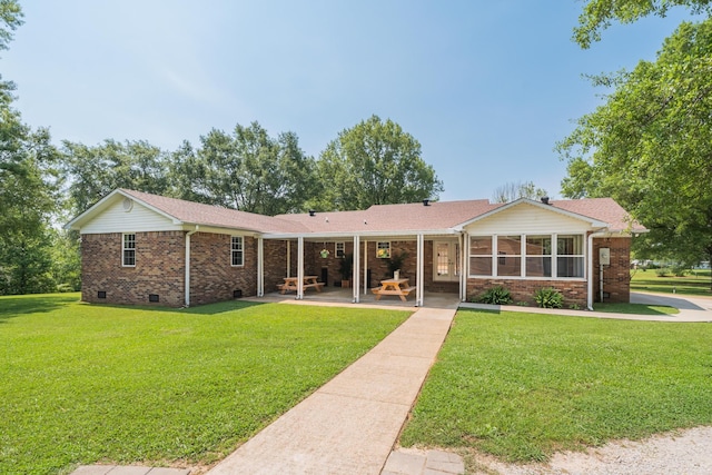 2250 Hamburg Rd, Michie, TN 38357 - rear view of house featuring brick siding, crawl space, a patio area, and a yard