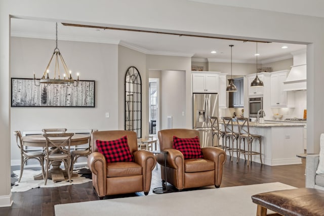 807 Caledonian Ct, Franklin, TN 37064 - living area featuring a chandelier, dark wood finished floors, ornamental molding, recessed lighting, and baseboards