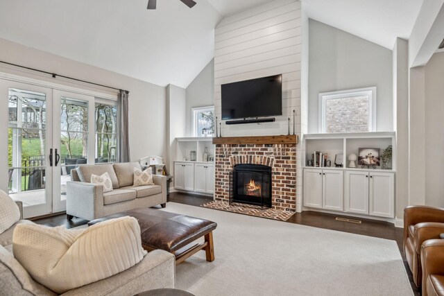 807 Caledonian Ct, Franklin, TN 37064 - living room with plenty of natural light, ceiling fan, high vaulted ceiling, a fireplace, and french doors