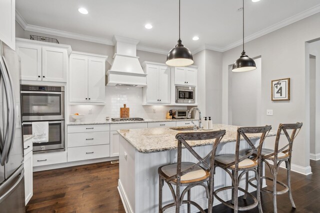 807 Caledonian Ct, Franklin, TN 37064 - kitchen featuring stainless steel appliances, a sink, premium range hood, dark wood-style floors, and backsplash