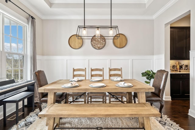 807 Caledonian Ct, Franklin, TN 37064 - dining room featuring dark wood finished floors, crown molding, wainscoting, a decorative wall, and a tray ceiling