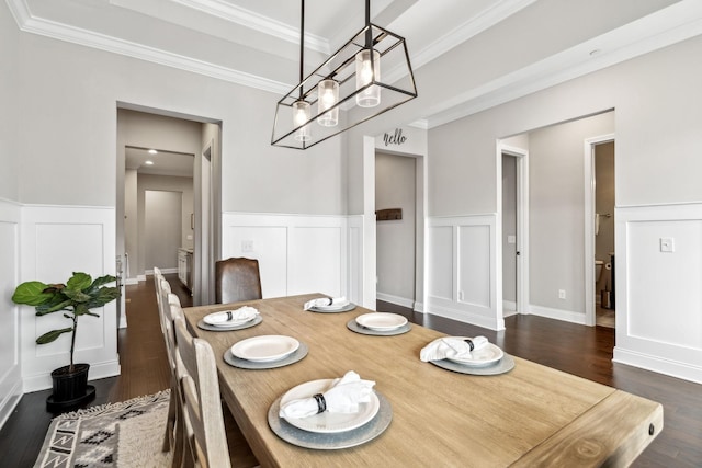 807 Caledonian Ct, Franklin, TN 37064 - dining room with ornamental molding, a decorative wall, dark wood-type flooring, a chandelier, and a wainscoted wall