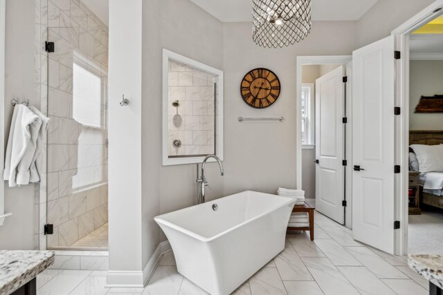 807 Caledonian Ct, Franklin, TN 37064 - ensuite bathroom with a freestanding tub, marble finish floors, tiled shower, and baseboards