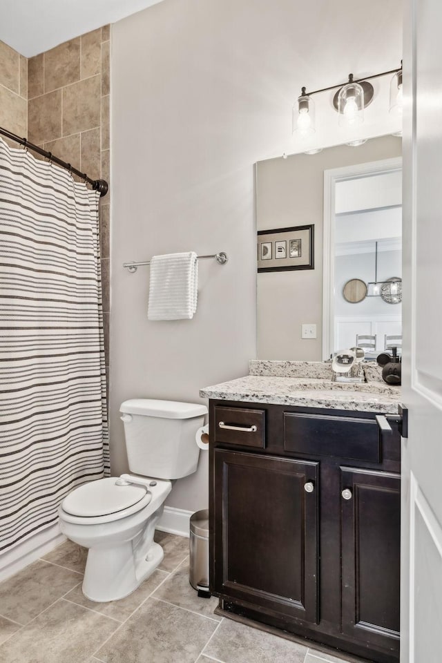 807 Caledonian Ct, Franklin, TN 37064 - bathroom featuring toilet, vanity, tile patterned floors, and curtained shower