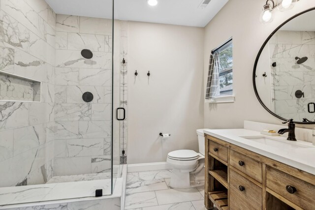 807 Caledonian Ct, Franklin, TN 37064 - bathroom with marble look tiles, a stall shower, vanity, toilet, and baseboards