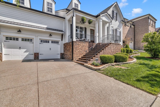 807 Caledonian Ct, Franklin, TN 37064 - view of front facade featuring brick siding, concrete driveway, a garage, a porch, and a front lawn