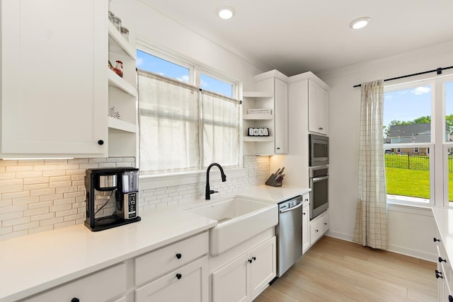 2019 Farm St, Mount Juliet, TN 37122 - kitchen with open shelves, stainless steel appliances, white cabinets, tasteful backsplash, and recessed lighting