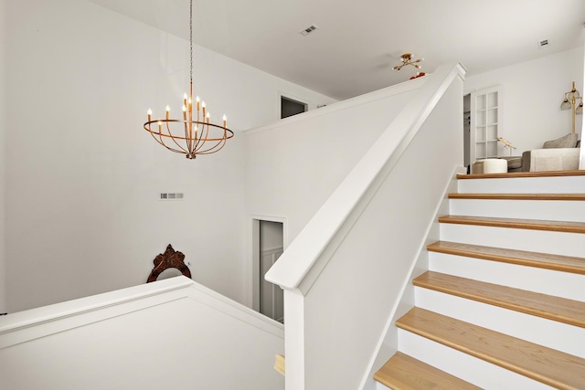 2019 Farm St, Mount Juliet, TN 37122 - staircase featuring a chandelier