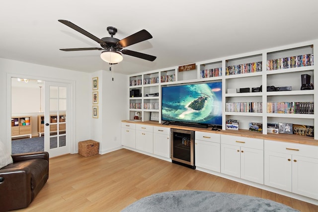 2019 Farm St, Mount Juliet, TN 37122 - living area with beverage cooler, light wood finished floors, ceiling fan, and french doors