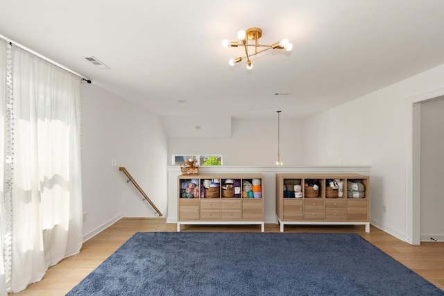 2019 Farm St, Mount Juliet, TN 37122 - living area featuring a chandelier and light wood finished floors