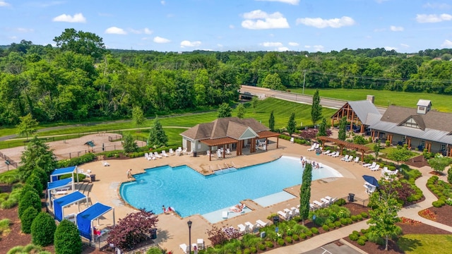 2019 Farm St, Mount Juliet, TN 37122 - community pool with a forest view and a patio area