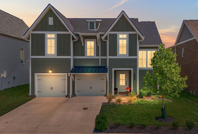2019 Farm St, Mount Juliet, TN 37122 - view of front of property with board and batten siding, driveway, a garage, and a yard