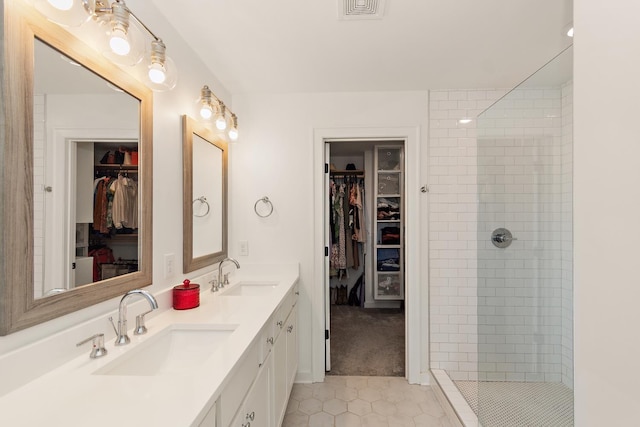 2019 Farm St, Mount Juliet, TN 37122 - full bathroom with double vanity, tile patterned floors, a spacious closet, and tiled shower