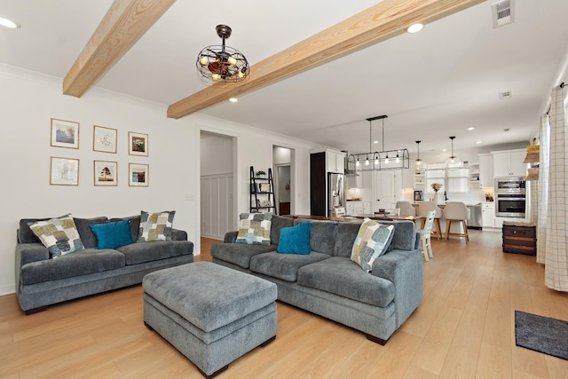 2019 Farm St, Mount Juliet, TN 37122 - living room featuring light wood finished floors, beam ceiling, recessed lighting, and a chandelier