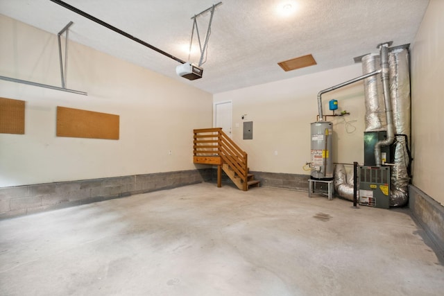1068 Tulip Grove Rd, Hermitage, TN 37076 - garage with water heater, electric panel, a garage door opener, and heating unit
