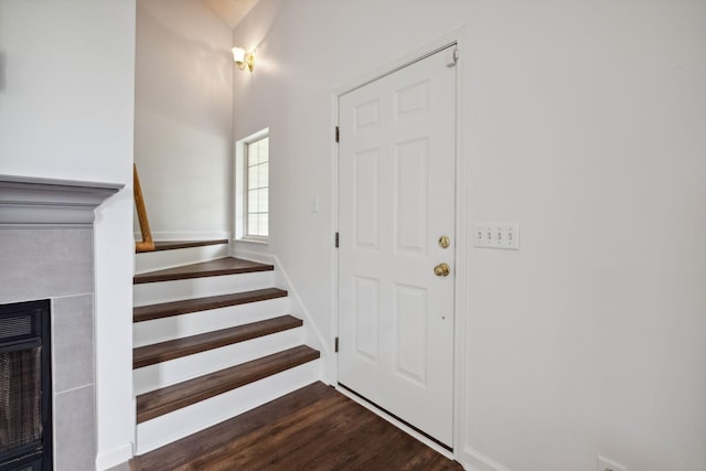 1068 Tulip Grove Rd, Hermitage, TN 37076 - foyer with stairs, dark wood-type flooring, and a fireplace