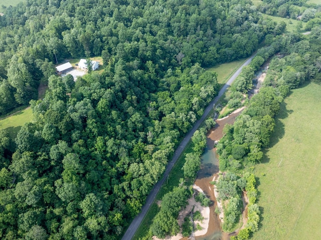 5660 Bold Springs Rd, Mc Ewen, TN 37101 - aerial view of property and surrounding area featuring a heavily wooded area