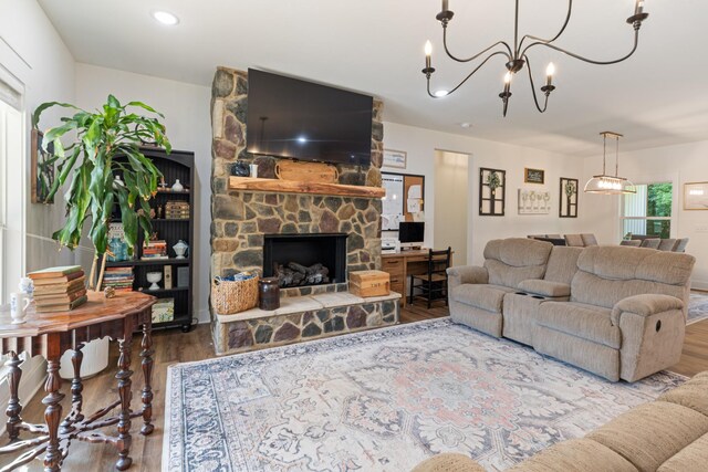 5660 Bold Springs Rd, Mc Ewen, TN 37101 - living room with wood finished floors and a stone fireplace