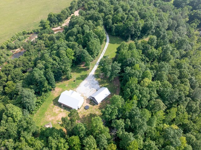 5660 Bold Springs Rd, Mc Ewen, TN 37101 - aerial view of property and surrounding area featuring a heavily wooded area