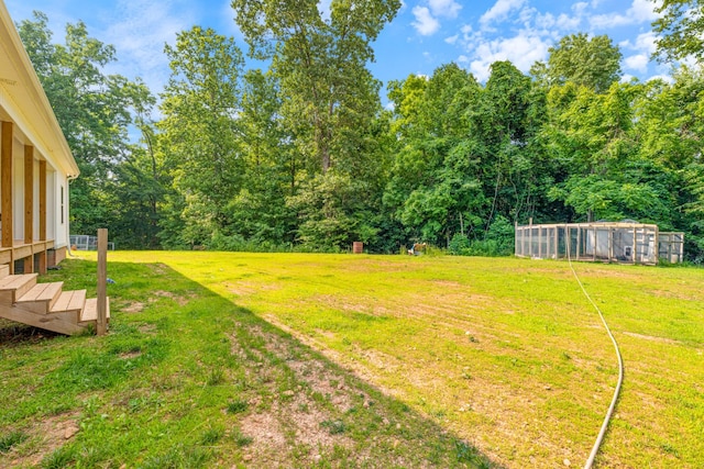 5660 Bold Springs Rd, Mc Ewen, TN 37101 - view of grassy yard with a forest view