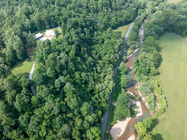 5660 Bold Springs Rd, Mc Ewen, TN 37101 - aerial view of property and surrounding area featuring a heavily wooded area