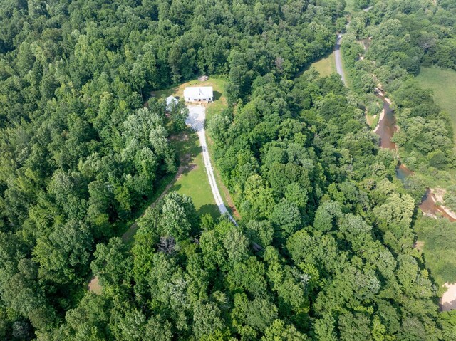 5660 Bold Springs Rd, Mc Ewen, TN 37101 - aerial view of property and surrounding area featuring a heavily wooded area