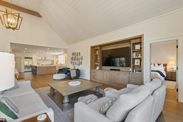 6115 Hillsboro Pike, Nashville, TN 37215 - living room with light wood-type flooring, a chandelier, high vaulted ceiling, and wood ceiling