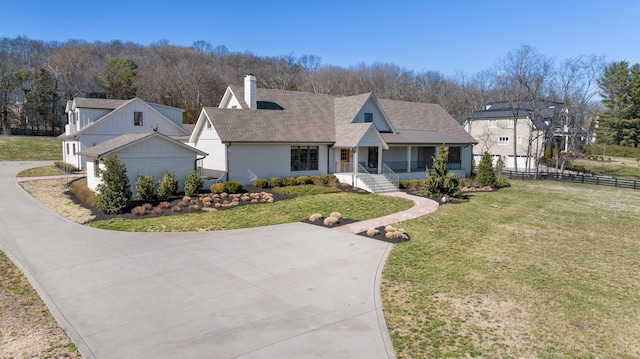 6115 Hillsboro Pike, Nashville, TN 37215 - view of front of home with covered porch, a chimney, and a shingled roof