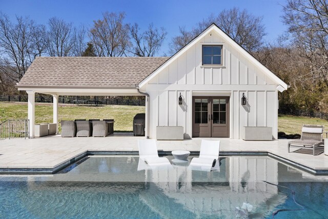 6115 Hillsboro Pike, Nashville, TN 37215 - swimming pool featuring a storage structure, an outbuilding, a patio, french doors, and a lawn