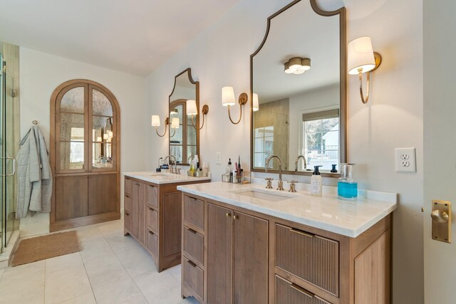 6115 Hillsboro Pike, Nashville, TN 37215 - full bathroom featuring a shower stall, two vanities, and tile patterned floors