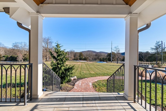 6115 Hillsboro Pike, Nashville, TN 37215 - covered porch with a mountain view and a lawn
